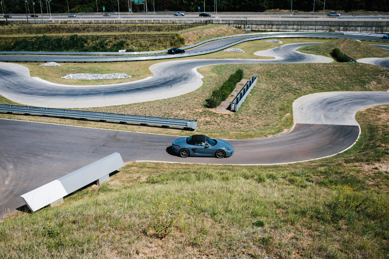 James Schembari and his son Sam Schembari, who are jointly leasing a Porsche, during a test drive on Porsche’s official test track in Atlanta, October 3, 2016.