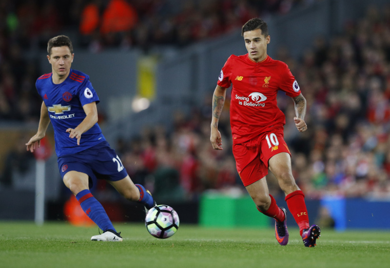 Liverpoolu00e2u20acu2122s Philippe Coutinho in action with Manchester Unitedu00e2u20acu2122s Ander Herrera during their Premier League match at Anfield, October 17, 2016. u00e2u20acu201d Reuters