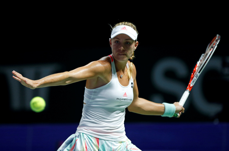 Angelique Kerber of Germany in action against Agnieszka Radwanska of Poland at the WTA Finals Singles semifinals in the Singapore Indoor Stadium, Singapore, October 29, 2016. u00e2u20acu201d Reuters pic