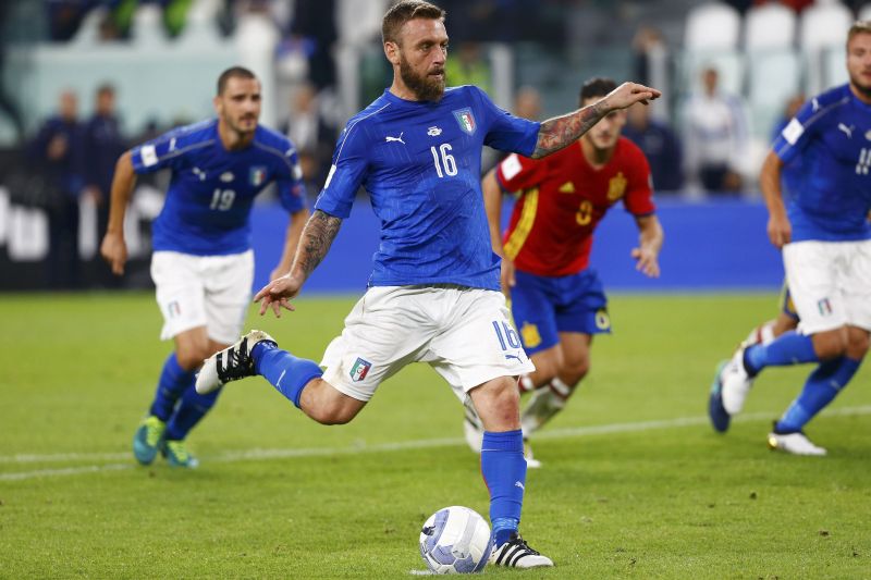 Italy's Daniele De Rossi scores a penalty against Spain. u00e2u20acu2022 Reuters pic