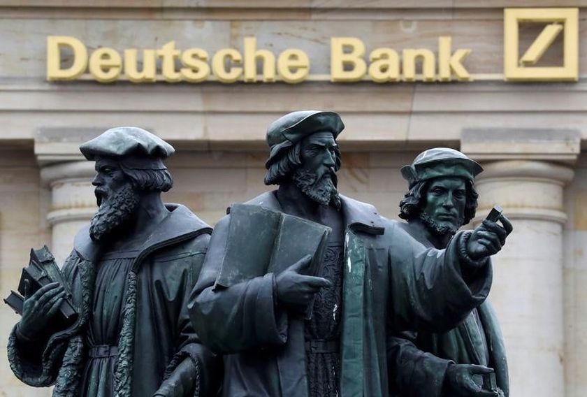 A statue is pictured next to the logo of Germany's Deutsche Bank in Frankfurt, Germany, Ocotber 1, 2016. u00e2u20acu2022 Reuters pic