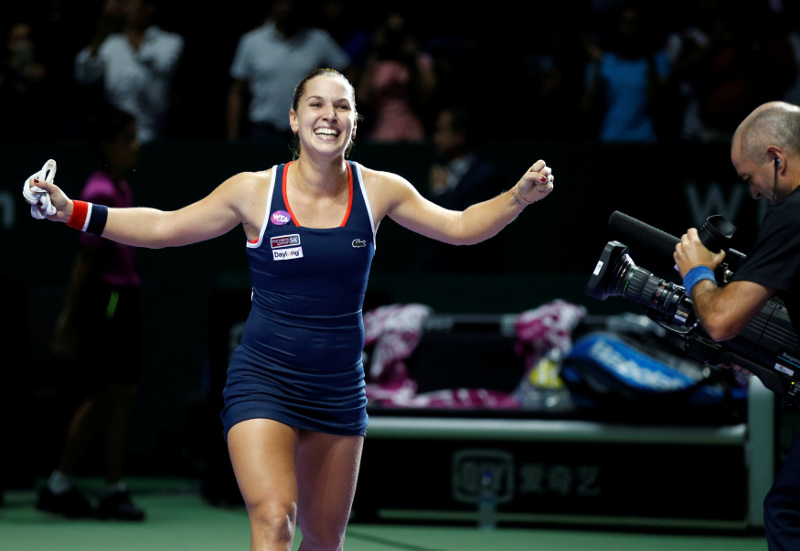 Dominika Cibulkova of Slovakia celebrates after defeating Svetlana Kuznetsova of Russia at the WTA Finals Singles semifinals in the Singapore Indoor Stadium, October 29, 2016. u00e2u20acu201d Reuters pic