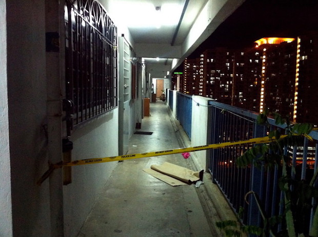 A police cordon is seen along a passageway in Danau Kota Flats in Setapak October 7, 2016. The body of a taxi driver was found in a rolled-up mattress in one of the units yesterday. u00e2u20acu201d Bernama pic