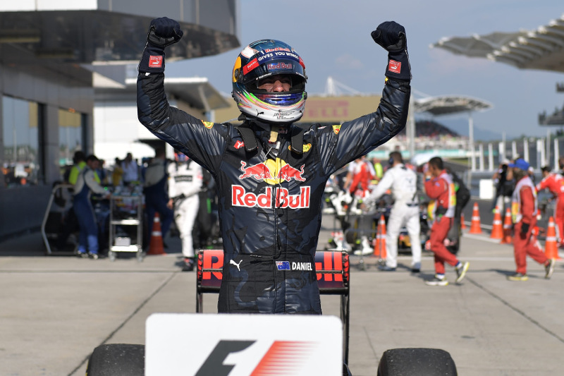 Red Bull Racingu00e2u20acu2122s Australian driver Daniel Ricciardo celebrates his victory after the Formula One Malaysian Grand Prix in Sepang on October 2, 2016. u00e2u20acu201d AFP pic
