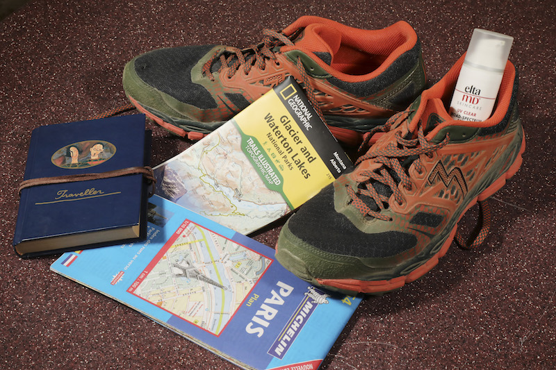 Some items that Captain Chesley Sullenberger always carries when travelling: good running shoes, sunscreen, paper maps and a journal, in Diablo, California, October 14, 2016. — Picture by Jim Wilson/The New York Times