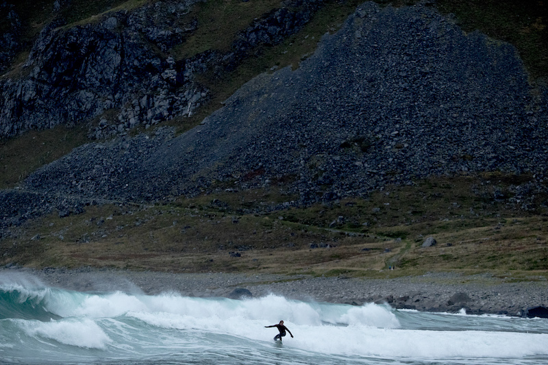 A surfer in the Norwegian Sea in Unstad, Norway, a remote town between two mountains where good surfing waves come ashore year-round, October 7, 2016. — Picture by Leslye Davis/The New York Times