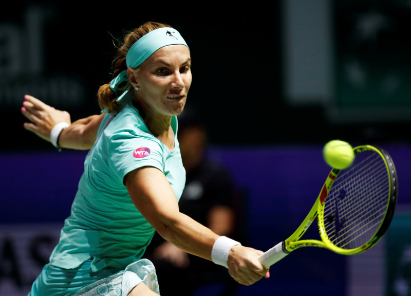 Svetlana Kuznetsova of Russia in action against Dominika Cibulkova of Slovakia at the WTA Finals singles semifinals u00e2u20acu201c in the Singapore Indoor Stadium, Singapore, October 29, 2016. u00e2u20acu201d Reuters pic