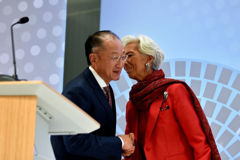 World Bank President Jim Yong Kim (left) takes the floor from IMF Director General Christine Lagarde (right) at the annual meetings of the IMF and World Bank Group in Washington, October 7, 2016. u00e2u20acu201d Reuters pic