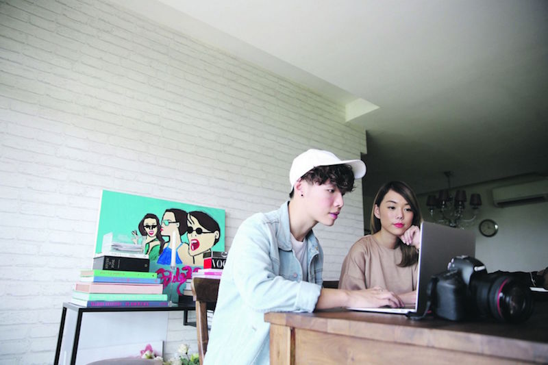 Andrea Chong and her photographer work it for the camera to nail the perfect Instagram shot. — TODAY pic