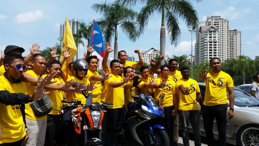 Afif (fifth from left) said PKR Youth members were also involved in Bersih 2.0's ongoing nationwide convoy and have additionally started the party's own mini-convoys to spread information on the rally. u00e2u20acu2022 Picture by Ida Lim