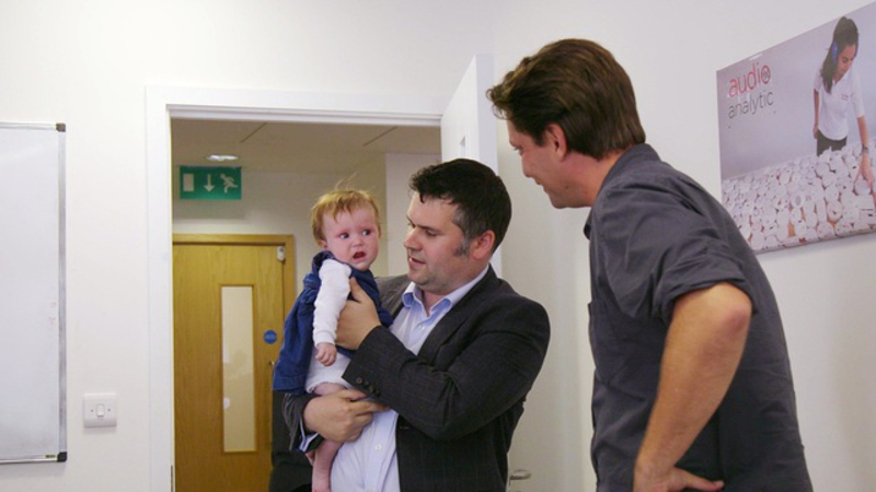 Audio Analytic founder and CEO Chris Mitchell (left) tests the audio smart home system on a hungry, angry baby with Hello World host Ashlee Vance (right). u00e2u20acu201d Bloomberg pic