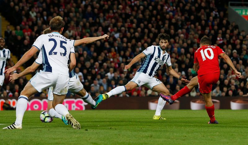 Philippe Coutinho (right) scores Liverpool's second goal against West Brom in their EPL clash at Anfield October 22, 2016. u00e2u20acu201d Reuters pic