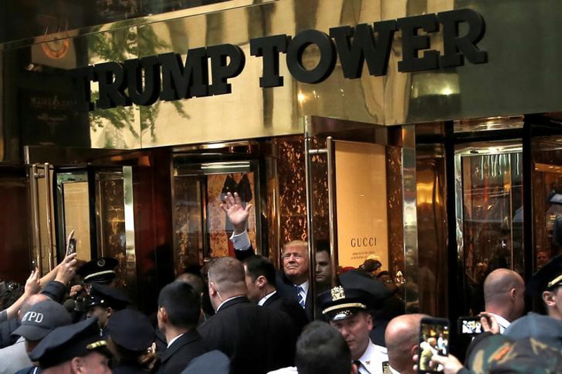 Republican presidential nominee Donald Trump waving to supporters outside the front door of Trump Tower where he lives in the Manhattan borough of New York, October 8, 2016. u00e2u20acu201d Reuters pic