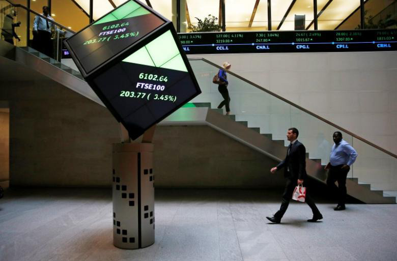 People walk through the lobby of the London Stock Exchange in London, Britain August 25, 2015. u00e2u20acu201d Reuters pic