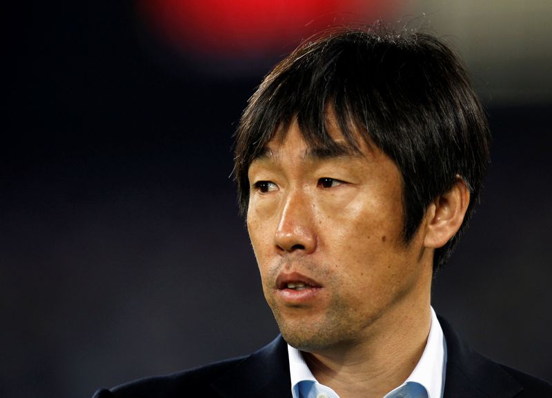China's coach Gao Hongbo reacts during their 2011 Asian Cup Group A match against Qatar at Khalifa stadium in Doha January 12, 2011. u00e2u20acu201d Reuters pic