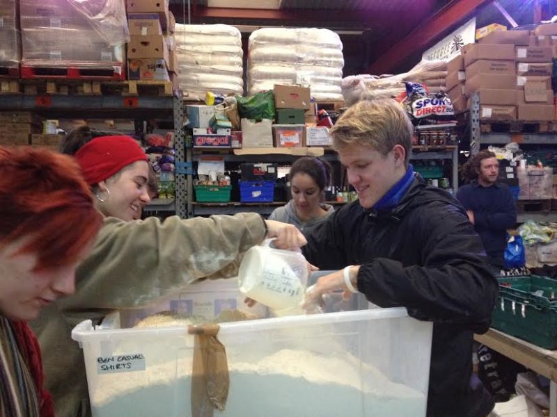Edith and Matthew seen here bagging flour for the Jungle residents.