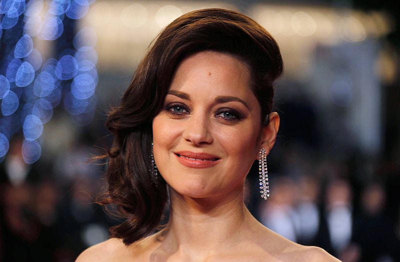 Marion Cotillard poses on the red carpet as she arrives for the screening of the film u00e2u20acu02dcItu00e2u20acu2122s Only the End of the Worldu00e2u20acu2122 in competition at the 69th Cannes Film Festival in Cannes May 19, 2016. u00e2u20acu2022 Reuters pic
