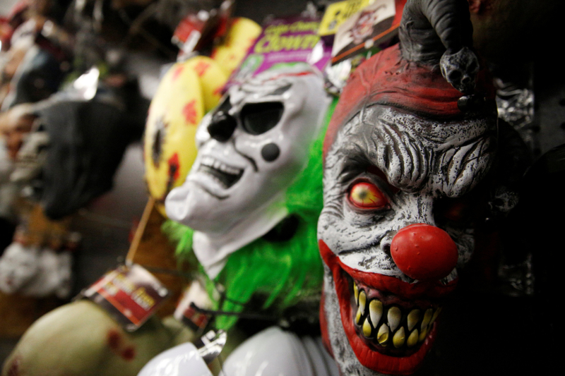 Creepy clown masks are displayed at a Halloween store in Brooklyn, New York October 20, 2016. —  Reuters pic