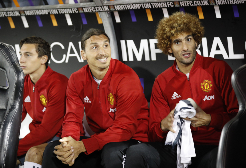 Manchester Unitedu00e2u20acu2122s Matteo Darmian, Zlatan Ibrahimovic and Marouane Fellaini sat on the substitutes bench during the EFL Cup match against Northampton Town September 21, 2016. u00e2u20acu201d Reuters pic