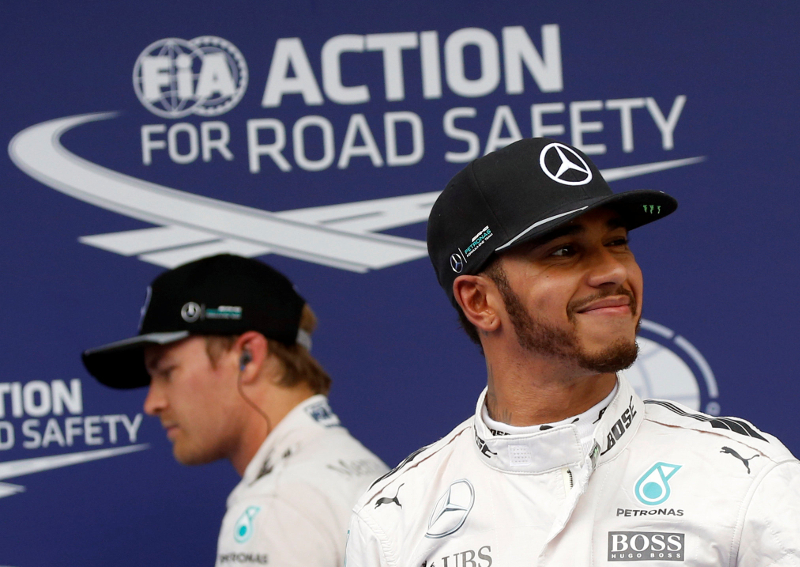 Mercedesu00e2u20acu2122 Lewis Hamilton of Britain winks to his fans after qualifying for pole position at the Malaysian F1 Grand Prix in Sepang October 1, 2016. u00e2u20acu201d Reuters pic