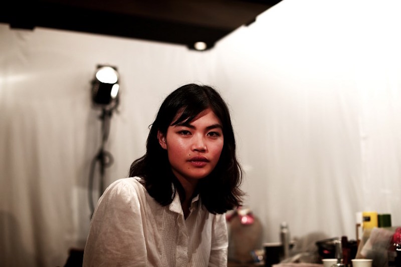 Japanese model Rina Fukushi looks at the camera on in back stage before the Tae Ashida 2017 Spring/Summer show in Tokyo October 17, 2016. u00e2u20acu201d AFP pic