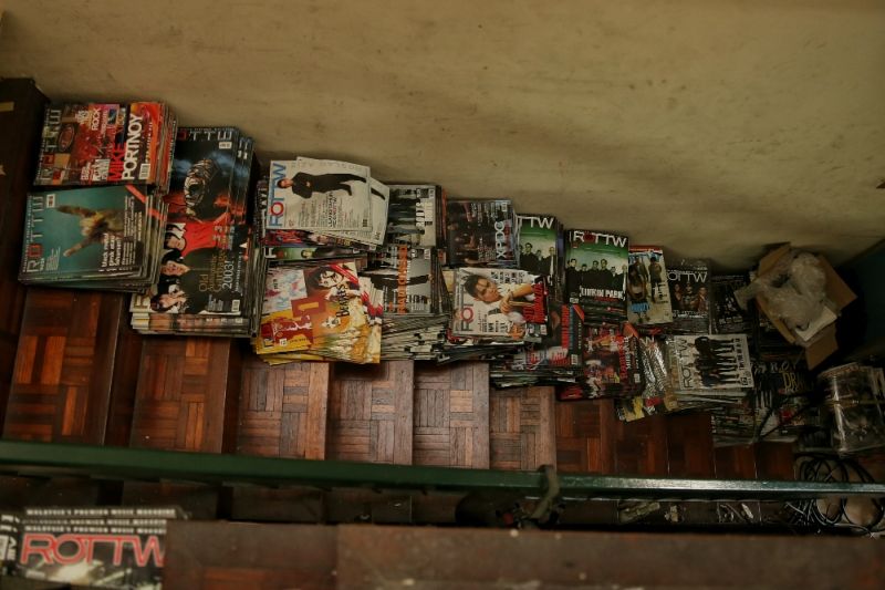 There are records and CDs everywhere in his double-storey house... seen here, lining the stairs.