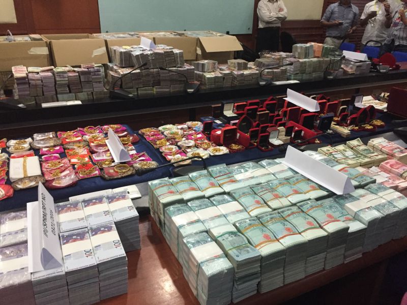 An array of cash, both in ringgit and foreign currency, jewellery, luxury watches and handbags were among items seized from two high-ranking Sabah Water Department officials in a graft investigation October 5, 2016. ― Picture by Julia Chan