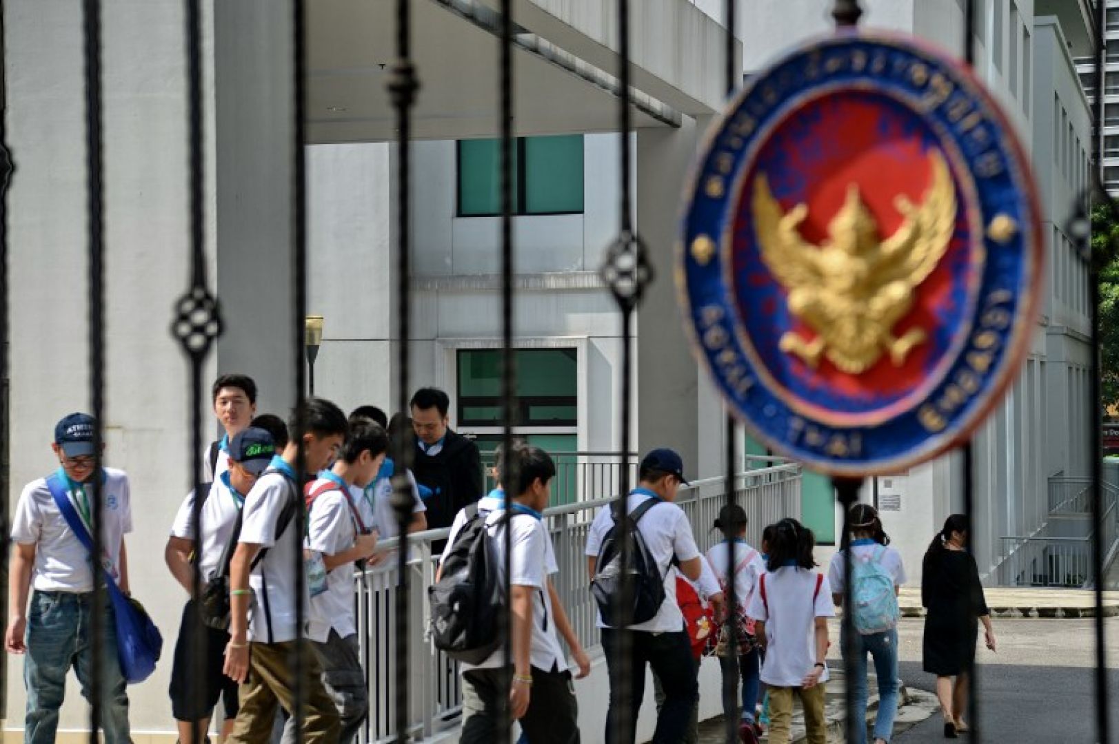 Thai students visit the Thai embassy in Singapore on October 14, 2016 to pay their respects to the late Thai King Bhumibol Adulyadej. u00e2u20acu201du00c2u00a0AFP pic