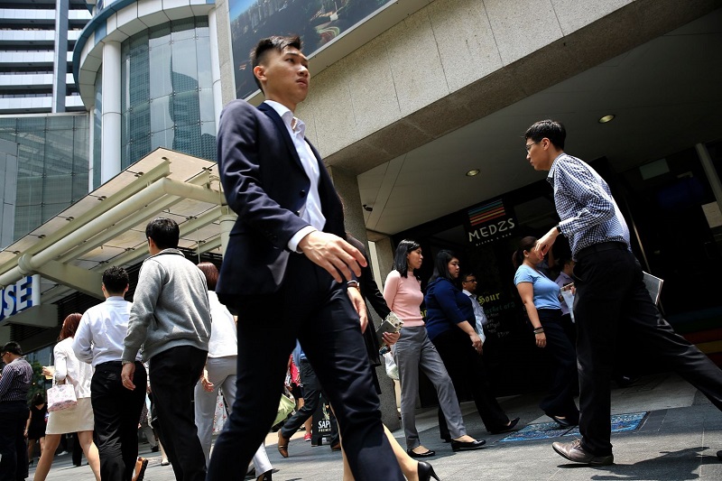 Last year, 37,000 more Singaporeans and permanent residents left the workforce compared to the average in the past three years. u00e2u20acu201d TODAY pic