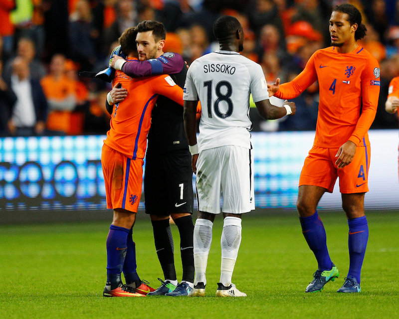 Netherlandu00e2u20acu2122s Vincent Janssen and Franceu00e2u20acu2122s goalkeeper Hugo Lloris hug after the match. u00e2u20acu201du00c2u00a0Reuters pic