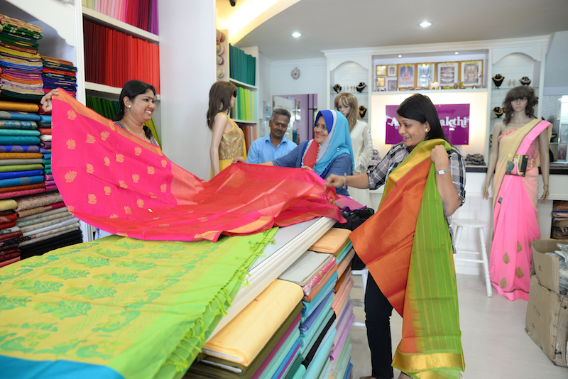 Puvaneswary Kanna (left), who has a passion for textiles and silk, took charge of the Ananda Sakhti Silk boutiques that offer sarees, punjabi suits, costume jewellery and tailoring services. — Picture by KE Ooi