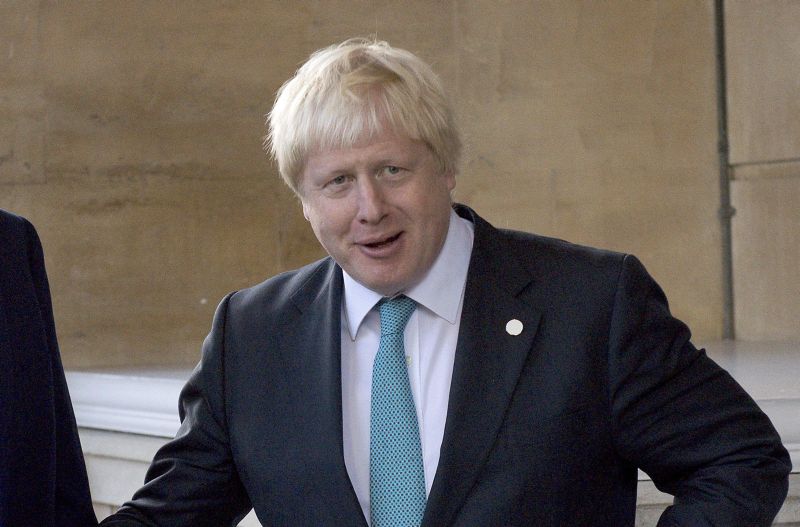 Britainu00e2u20acu2122s Foreign Secretary Boris Johnson greets guests ahead of a meeting at Lancaster House, in London, October 16, 2016. REUTERS/Justin Tallis/Pool