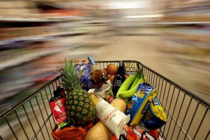 A shopping trolley is pushed around a supermarket in London, May 19, 2015. u00e2u20acu201d Reuters pic