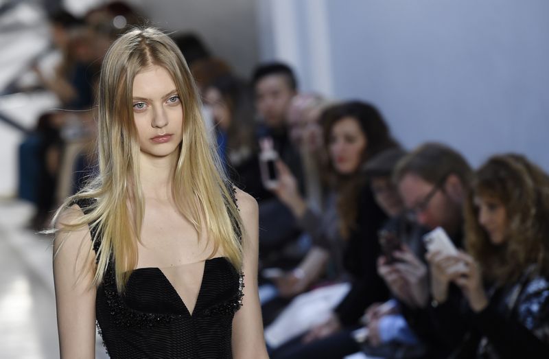 When did the trend for expressionless models start? u00e2u20acu201d AFP pic