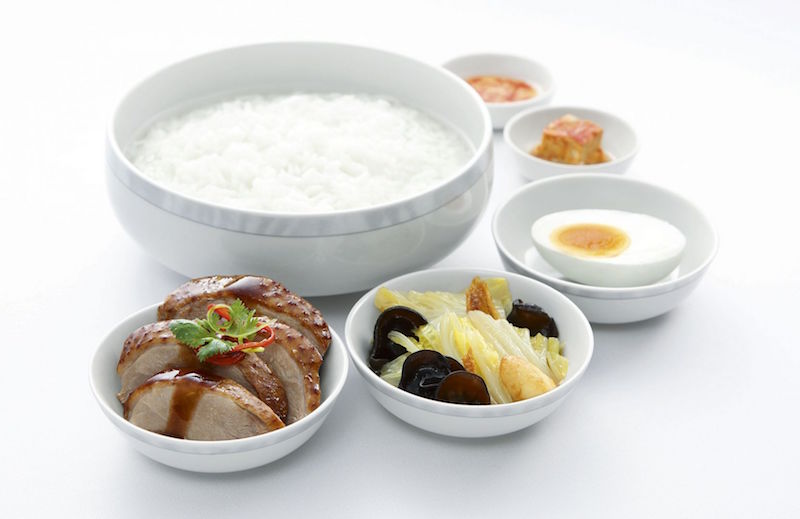 Yum yum, Teochew porridge with braised duck, salted egg and braised cabbage will be available for Business Class passengers onboard Singapore Airlines. u00e2u20acu201d Picture courtesy of  Singapore Airlines