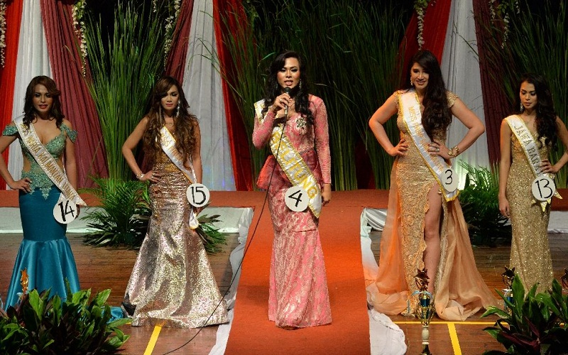 Indonesian transgenders paraded in colourful, glittering evening gowns on November 11 in a secret beauty pageant that hoped to avoid unwanted attention from hardliners in the Muslim-majority nation. u00e2u20acu201d AFP pic