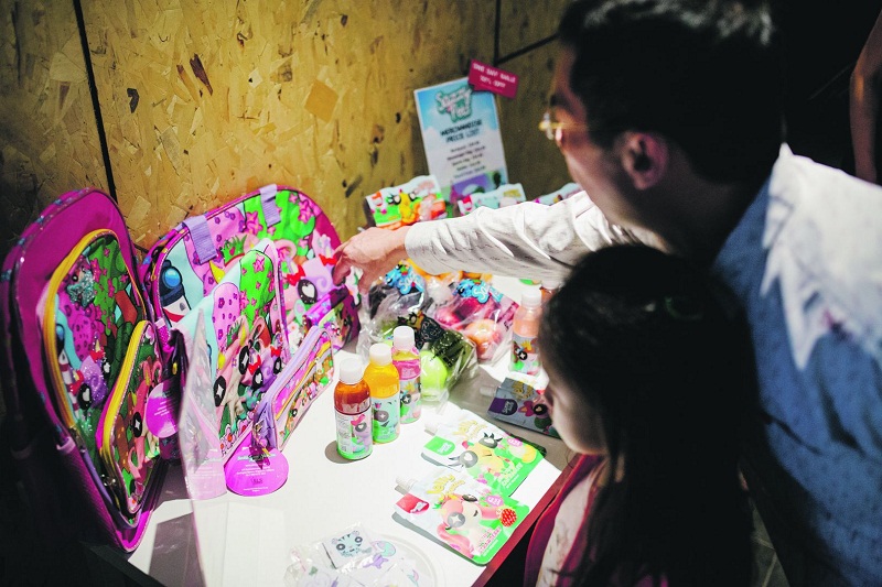 Guests looking through the range of SazzyPets merchandise available. — Picture courtesy of SazzyPets