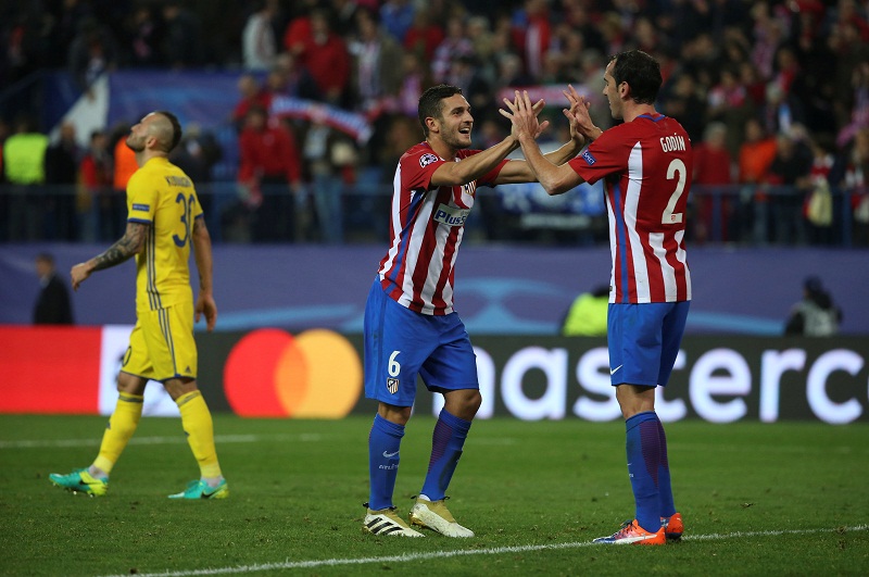 Atletico Madridu00e2u20acu2122s Koke and Diego Godin celebrate at the end of their match against Rostov during the Uefa Champions League match at the Vicente Calderon stadium in Madrid, Spain. u00e2u20acu201d Reuters pic