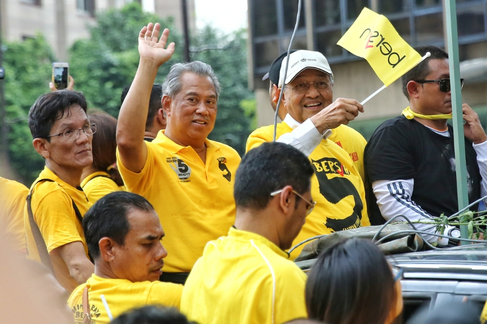 Former deputy prime minister Datuk Seri Muhyiddin Yassin (left) and former prime minister Mahathir Mohamad at the Bersih 5 rally at KLCC November 19, 2016. u00e2u20acu201d Picture by Saw Siow Feng