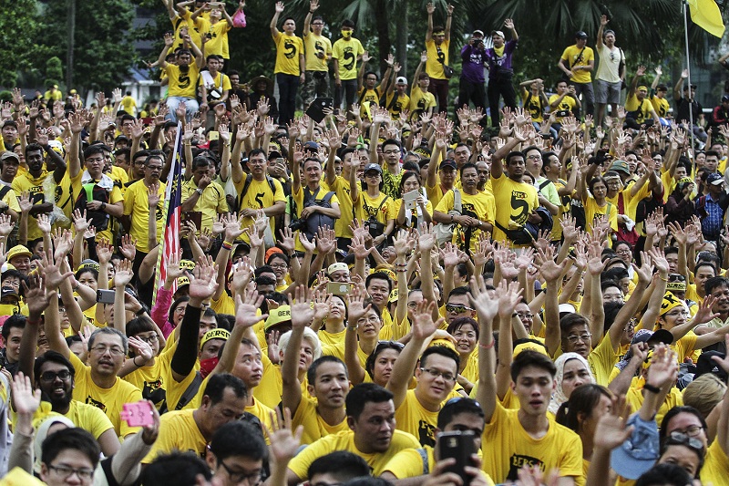 Protesters sit on the road at Jalan Ampang during the Bersih 5 rally in Kuala Lumpur November 2016. u00e2u20acu201d Picture by Yusof Mat Isa
