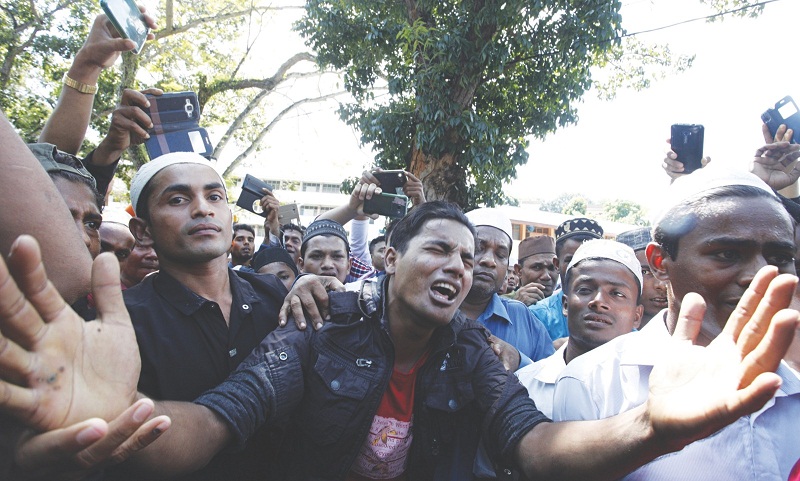 Participants at a gathering to condemn the actrocities against the Rohingya in Gelugor, Penang, last Thursday. u00e2u20acu201d Picture by Sayuti Zainudin
