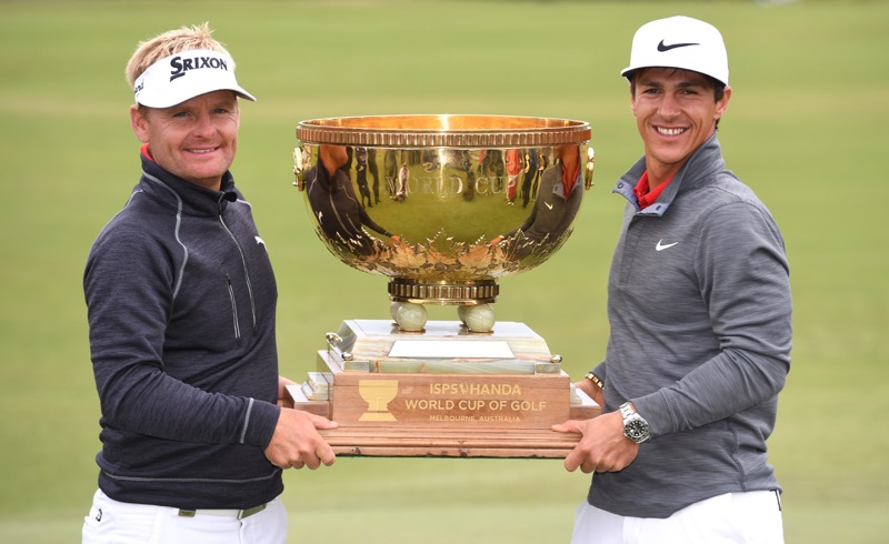 Soren Kjeldsen (left) and Thorbjorn Olesen (right) of Denmark pose with the trophy after winning the World Cup of Golf on the Kingston Heath course in Melbourne on November 27, 2016.  u00e2u20acu201d AFP pic