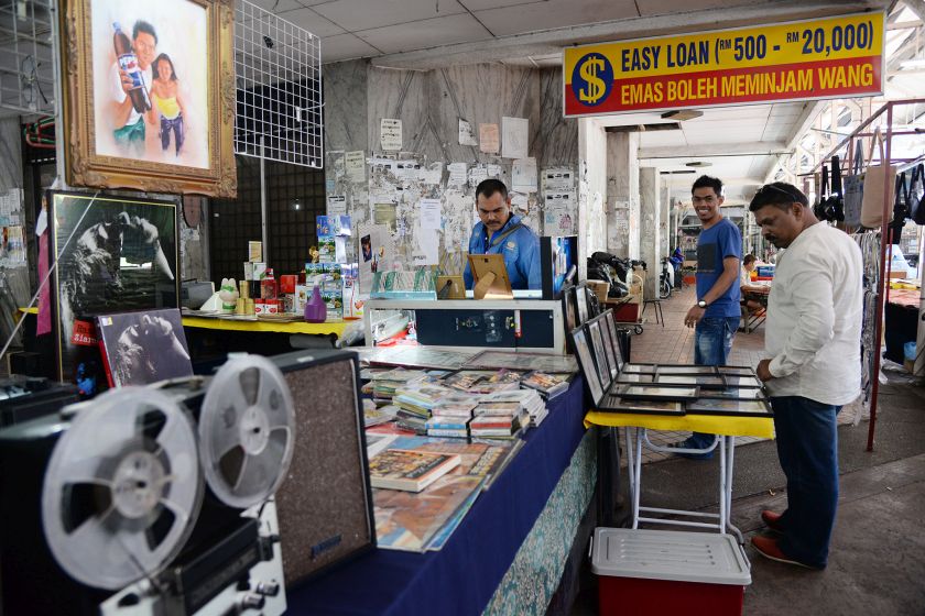Books and framed paintings for sale at Rope Walk, Taman Selat. u00e2u20acu201d Pictures by KE Ooi