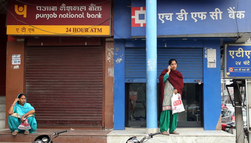 Women wait for ATM counters to open in Jammu, India, November 12, 2016. u00e2u20acu2022 Reuters pic