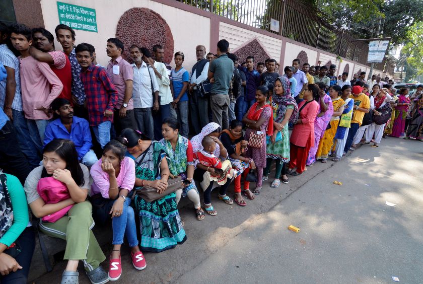 People queue to exchange and deposit their old high denomination banknotes outside a bank in Guwahati, India November 12, 2016. u00e2u20acu2022 Reuters pic