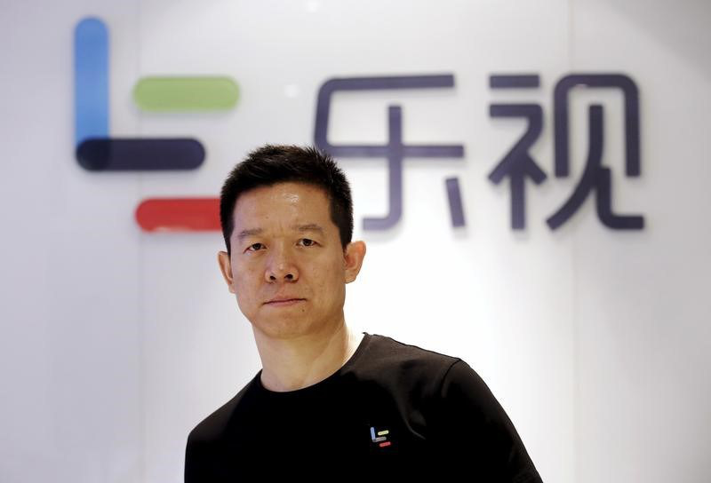 Jia Yueting, co-founder and head of Le Holdings Co Ltd, also known as LeEco, poses for a photo in front of a logo of his company in Beijing, April 22, 2016. u00e2u20acu201d Reuters pic