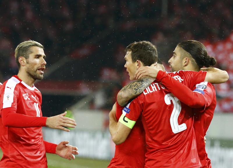 Switzerland's Stephan Lichtsteiner reacts with teammate after scoring during the Switzerland v Faroe Islands World Cup 2018 Qualifier match at Swissporarena, Luzern, Switzerland.u00c2u00a0u00e2u20acu201d Reuters pic 