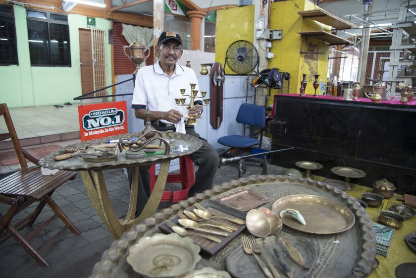 The antique and brass stall owned by Mohd Kassim Mohd Hanifa, who is known as Mamu Kassim to his customers. 