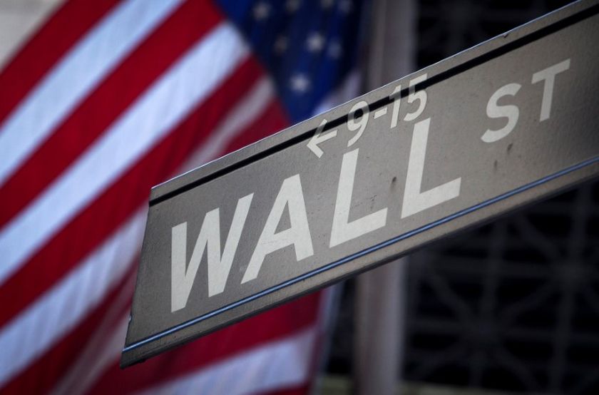 A Wall Street sign is pictured outside the New York Stock Exchange in New York, October 28, 2013. u00e2u20acu201d Reuters pic