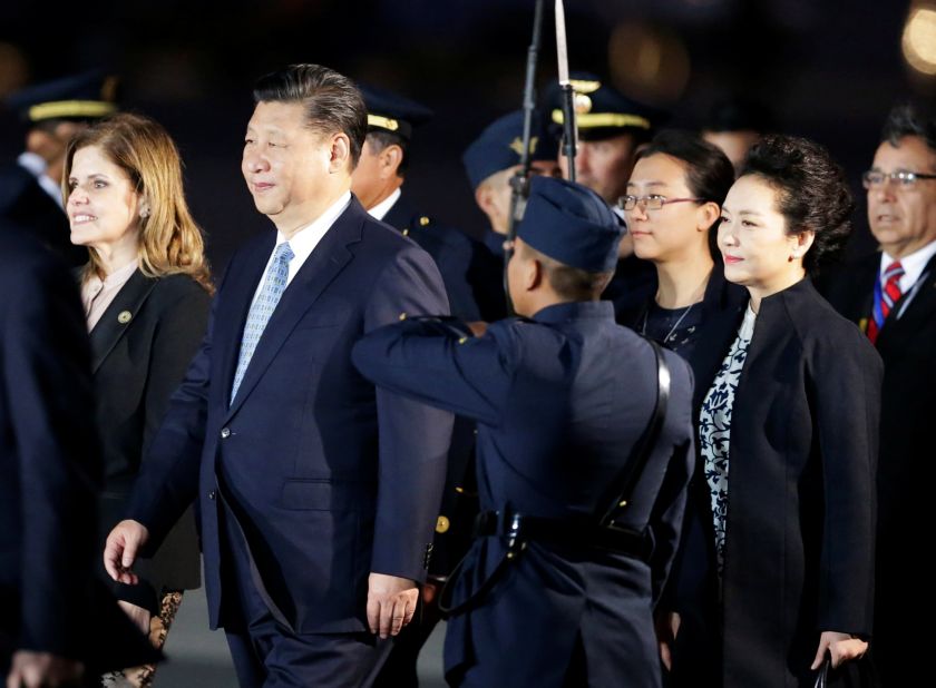 Chinau00e2u20acu2122s President Xi Jinping (2nd left) and Peruu00e2u20acu2122s second Vice President Mercedes Araoz (left) walk after he and his wife Peng Liyuan (2nd right) arrived for the 2016 Apec  summit in Lima, Peru November 18, 2016. u00e2u20acu201d Reuters pic